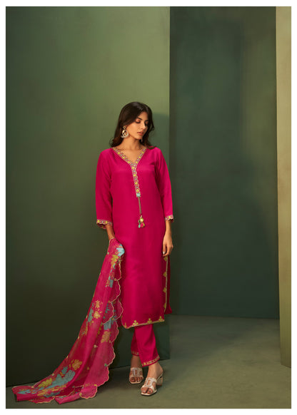 Add a touch of elegance to your wardrobe with this exquisite Kurta, Pant, and Dupatta Set in a charming Barbie pink hue, perfect for festive and
special occasions.