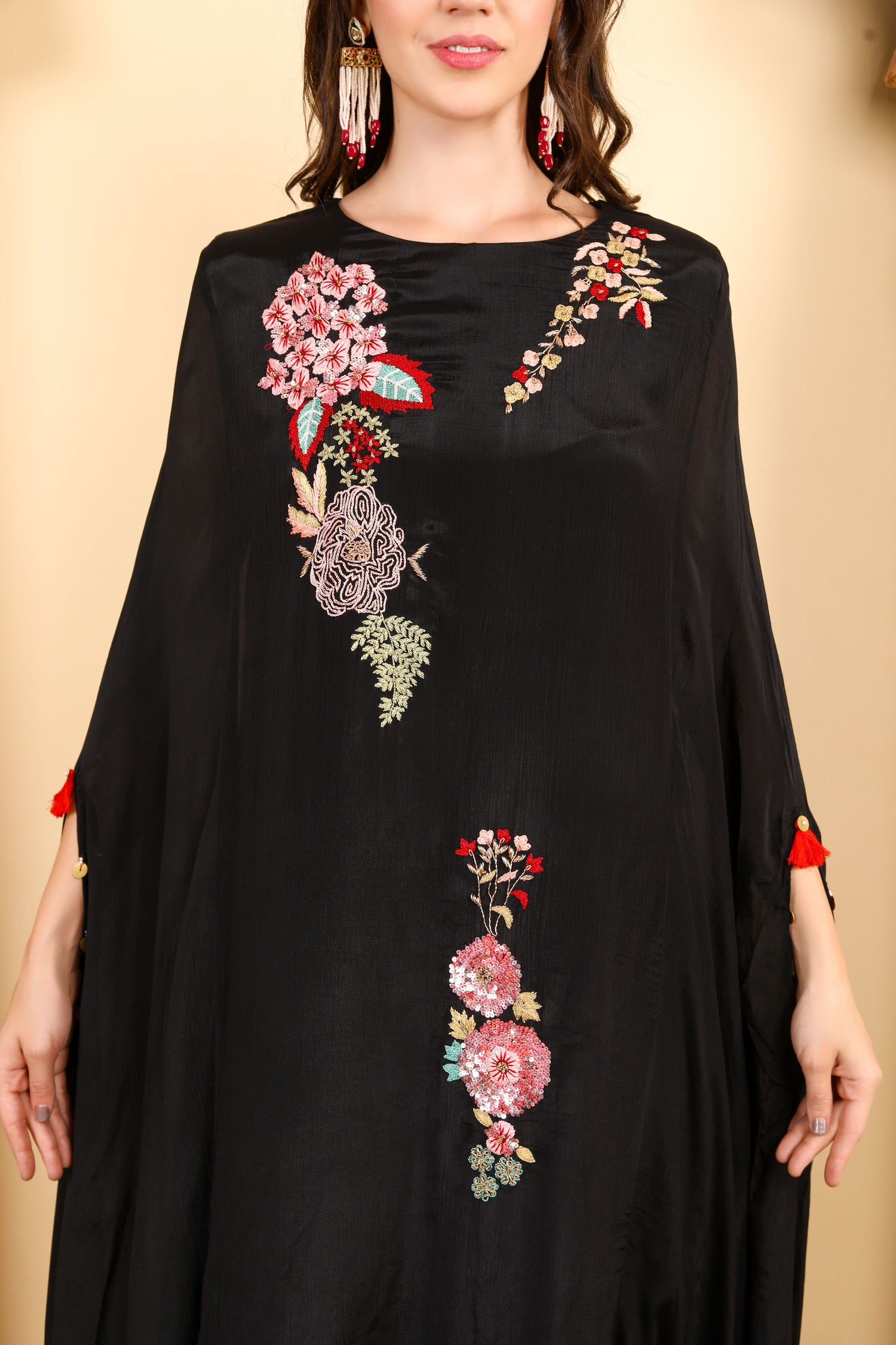 Black Floral hand Embroidered Kaftan-Style outfit with Tassel Detailing and Modern Elegance