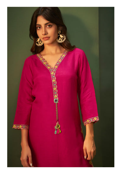 Add a touch of elegance to your wardrobe with this exquisite Kurta, Pant, and Dupatta Set in a charming Barbie pink hue, perfect for festive and
special occasions.