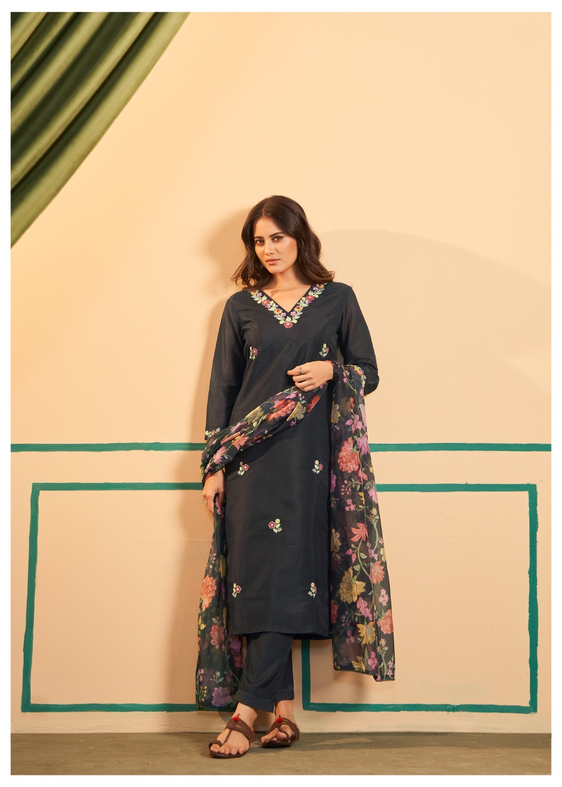 Make a striking statement with this elegant Black Kurta, Pant, and Dupatta Set, a perfect blend of luxury and sophistication for festive
occasions and formal gatherings.