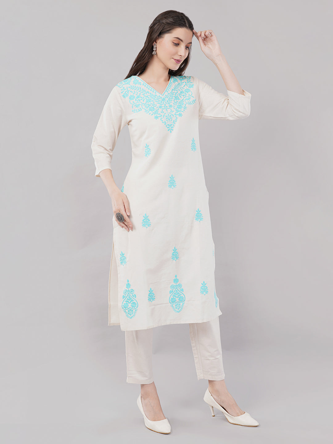 Off-white with  turquoise blue embroideryStraight-cut kurta adorned with intricate floral embroidery with pant and dupatta