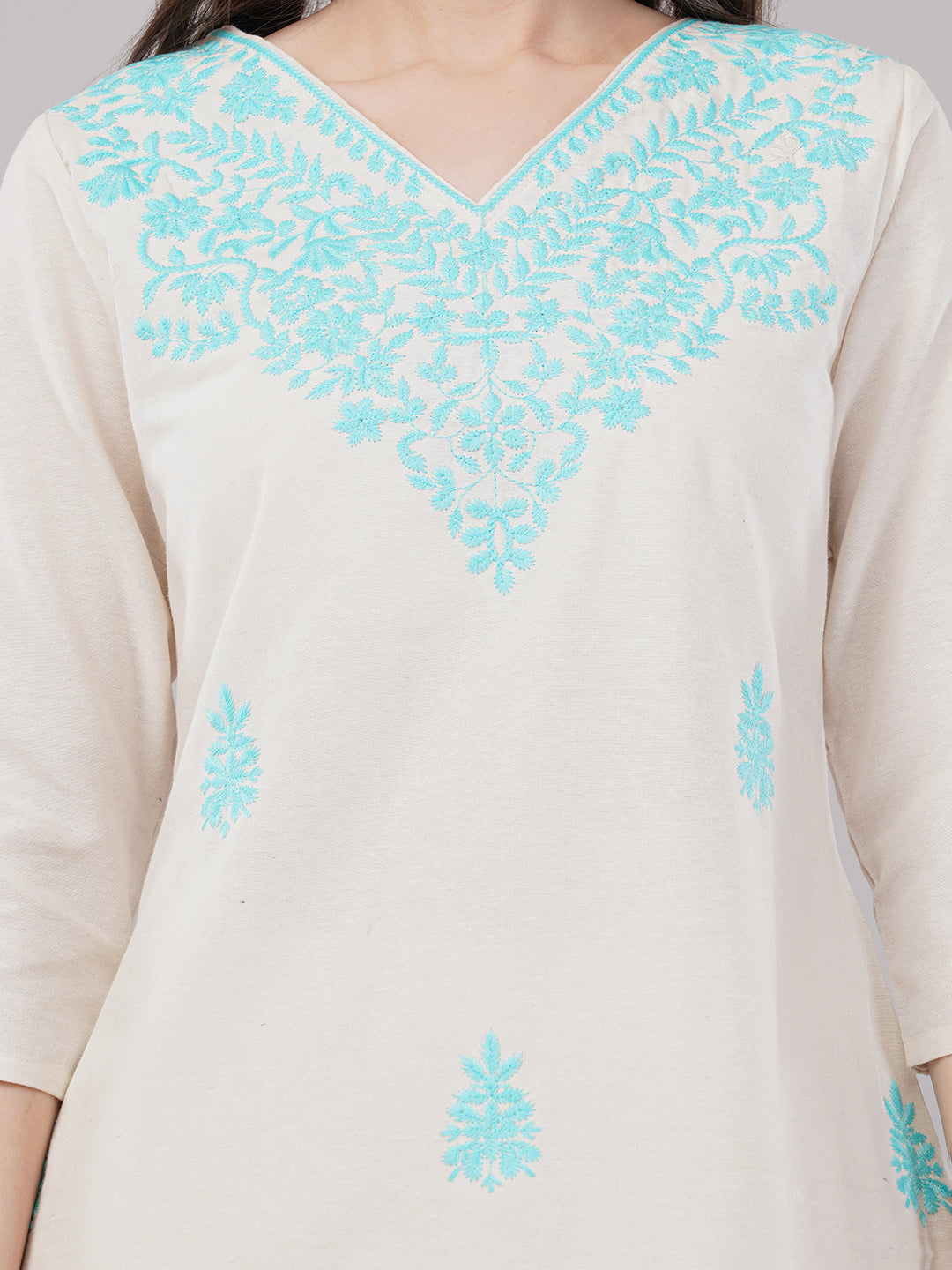 Off-white with  turquoise blue embroideryStraight-cut kurta adorned with intricate floral embroidery with pant and dupatta