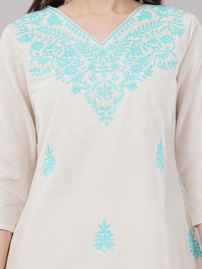 Off-white with  turquoise blue embroideryStraight-cut kurta adorned with intricate floral embroidery with pant and dupatta