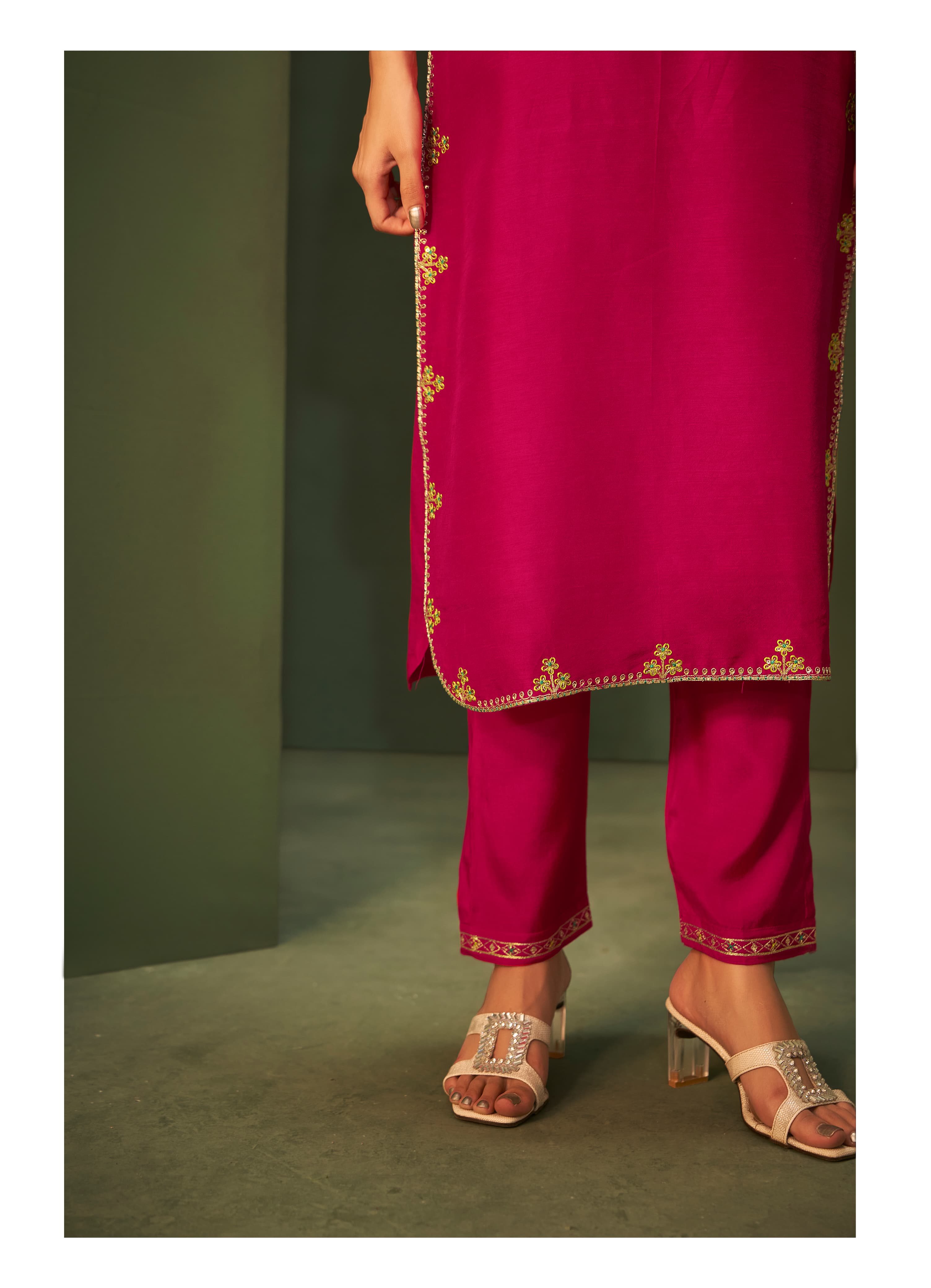 Add a touch of elegance to your wardrobe with this exquisite Kurta, Pant, and Dupatta Set in a charming Barbie pink hue, perfect for festive and
special occasions.