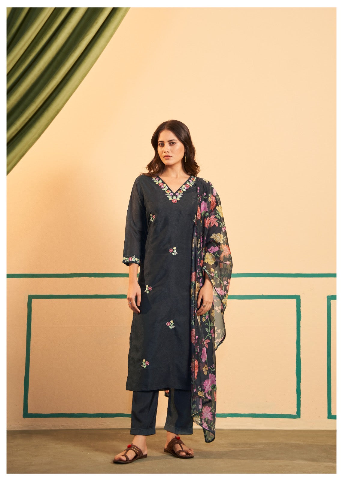 Make a striking statement with this elegant Black Kurta, Pant, and Dupatta Set, a perfect blend of luxury and sophistication for festive
occasions and formal gatherings.